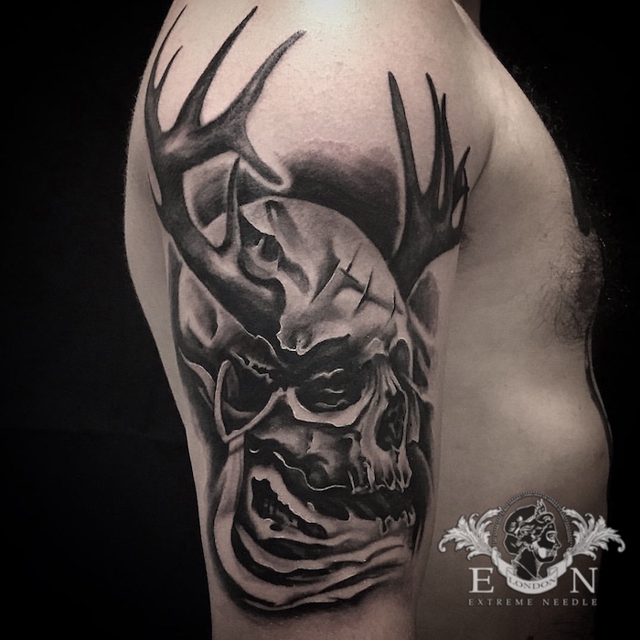 Horned skull tattoo