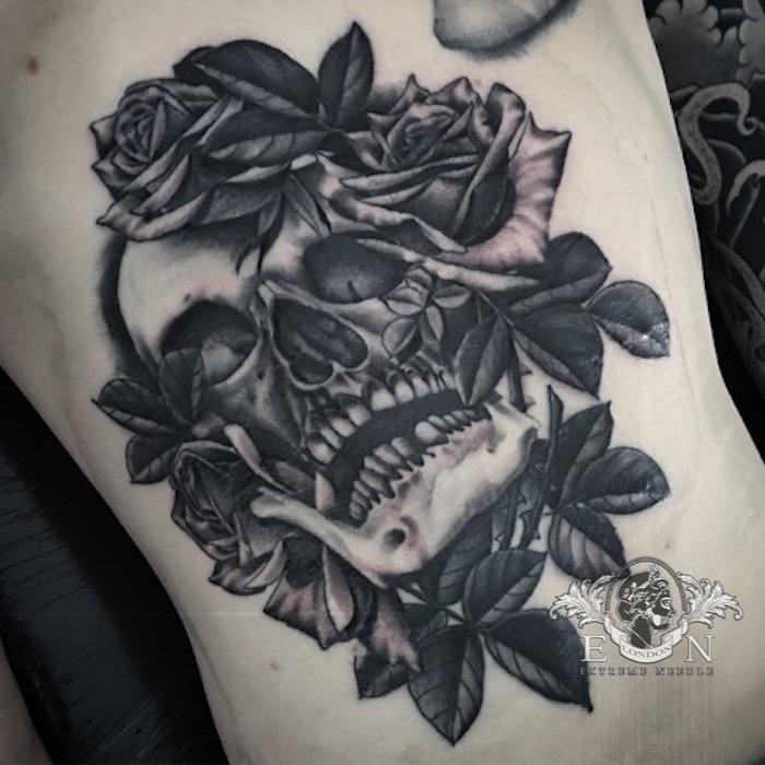 Skull and roses black and grey tattoo
