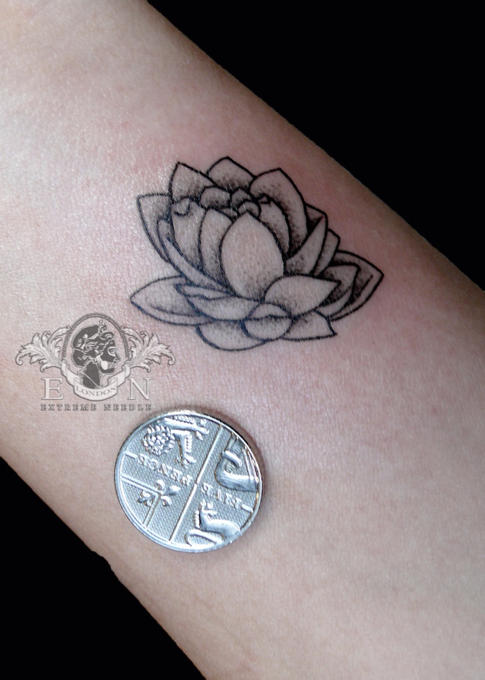 Lotus mini tattoo
